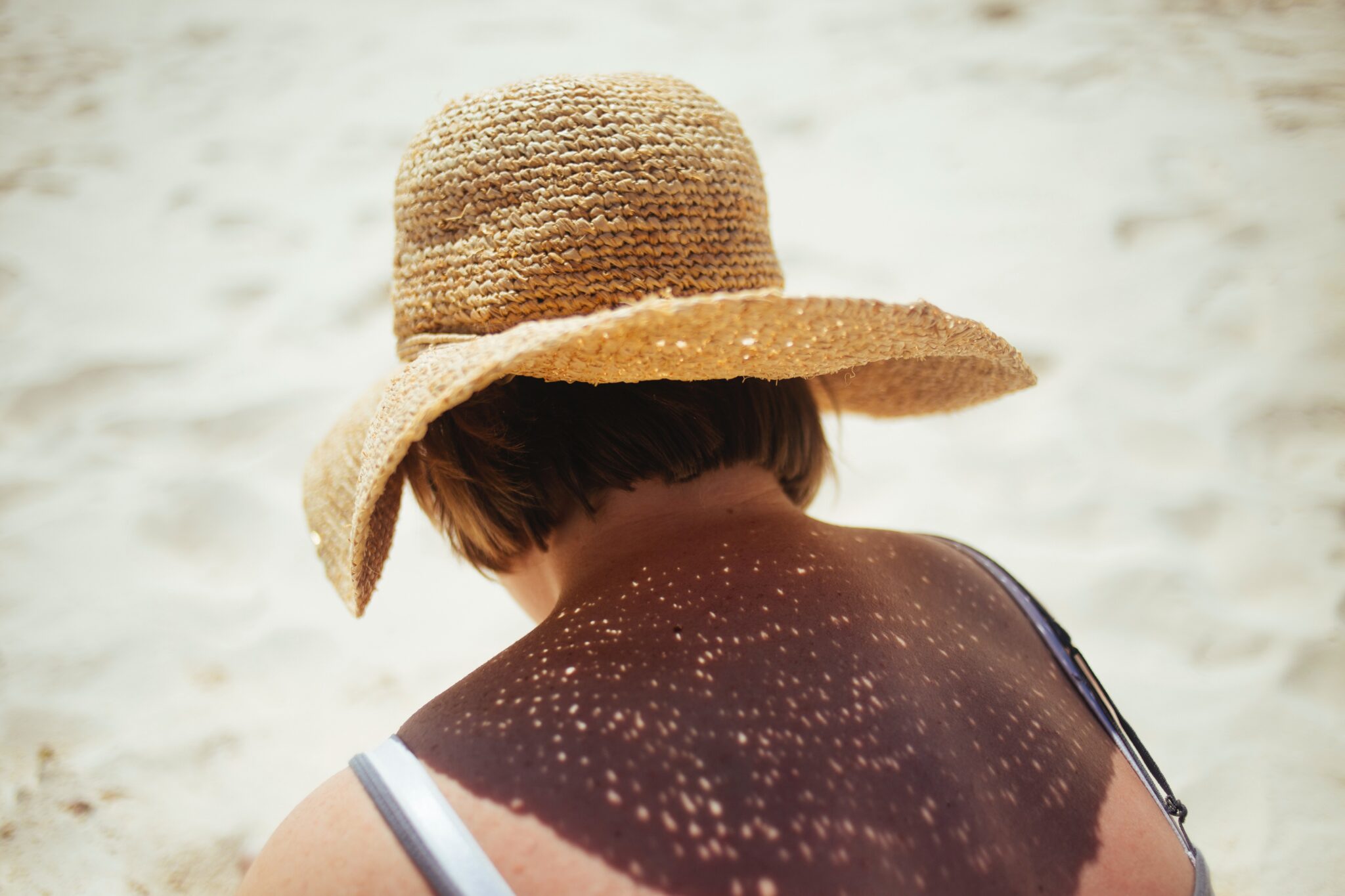 Person wearing brown Sunday hat during day time by Meg Sanchez