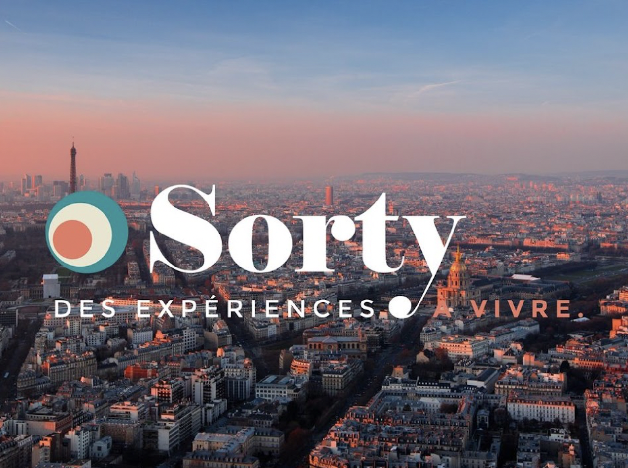 image de pub sorry avec en fond une vue sur la Tour Eiffel sous un couché de soleil